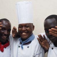 Basecamp Explorer Kenya kitchen staff smiling.